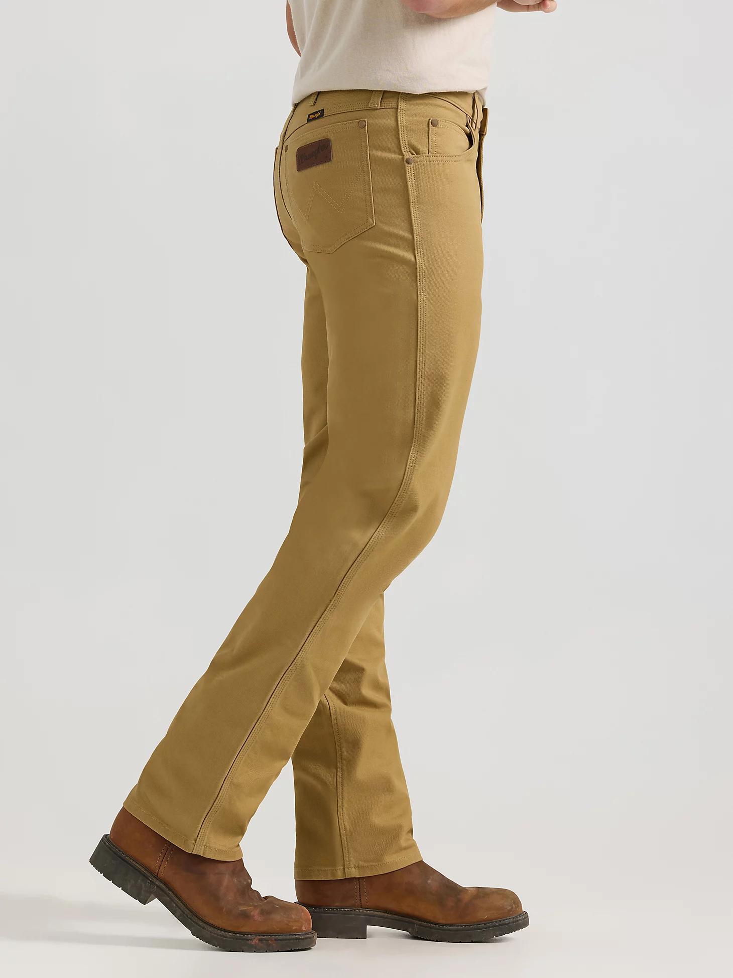 Premium Performance Tough Comfort Cowboy Cut® Regular Fit Canvas Jean | Men's JEANS | Wrangler® Product Image