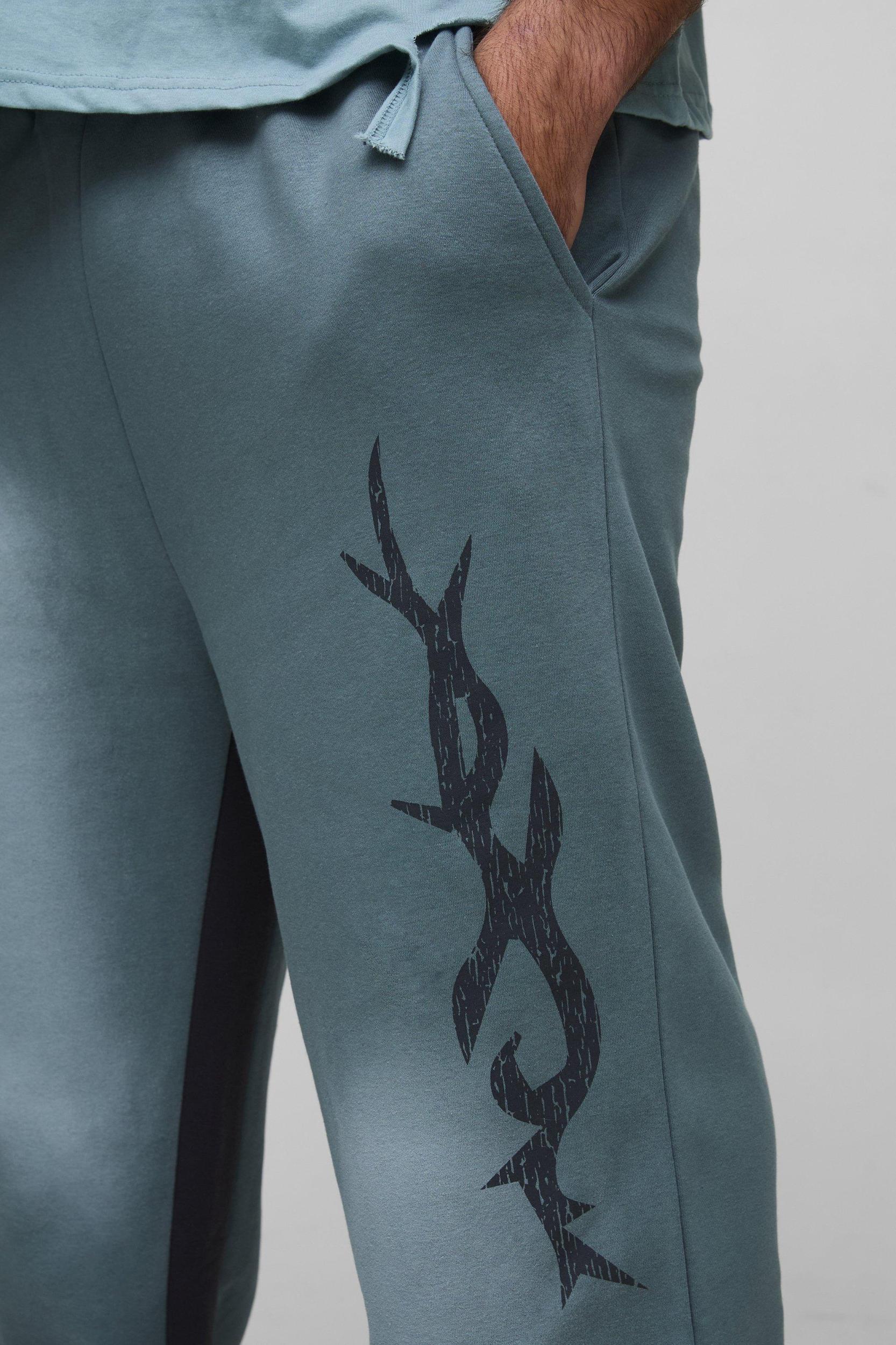 Plus Relaxed Fit Flare Spray Wash Graphic Joggers | boohooMAN USA Product Image