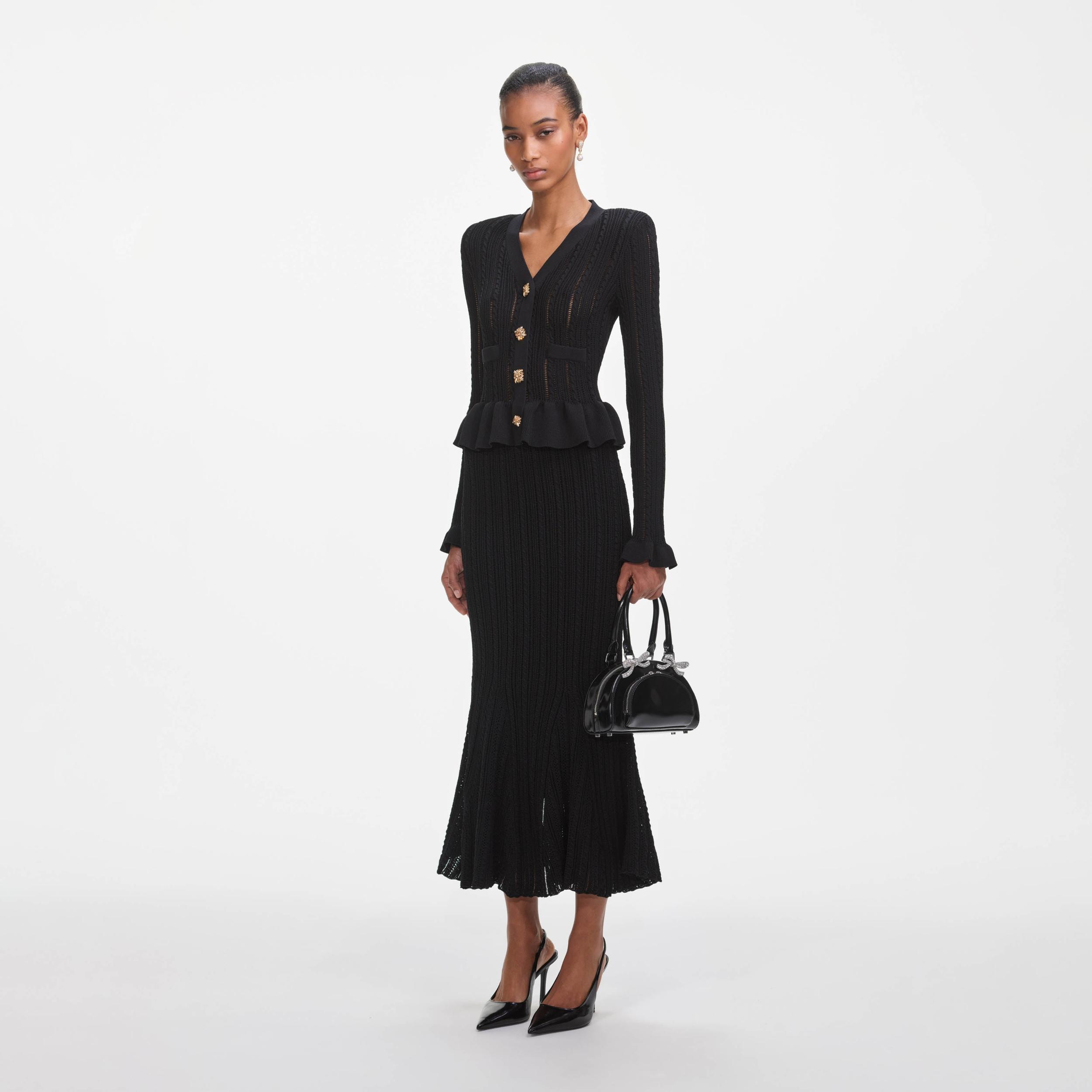 Black Knit Peplum Midi Dress Product Image