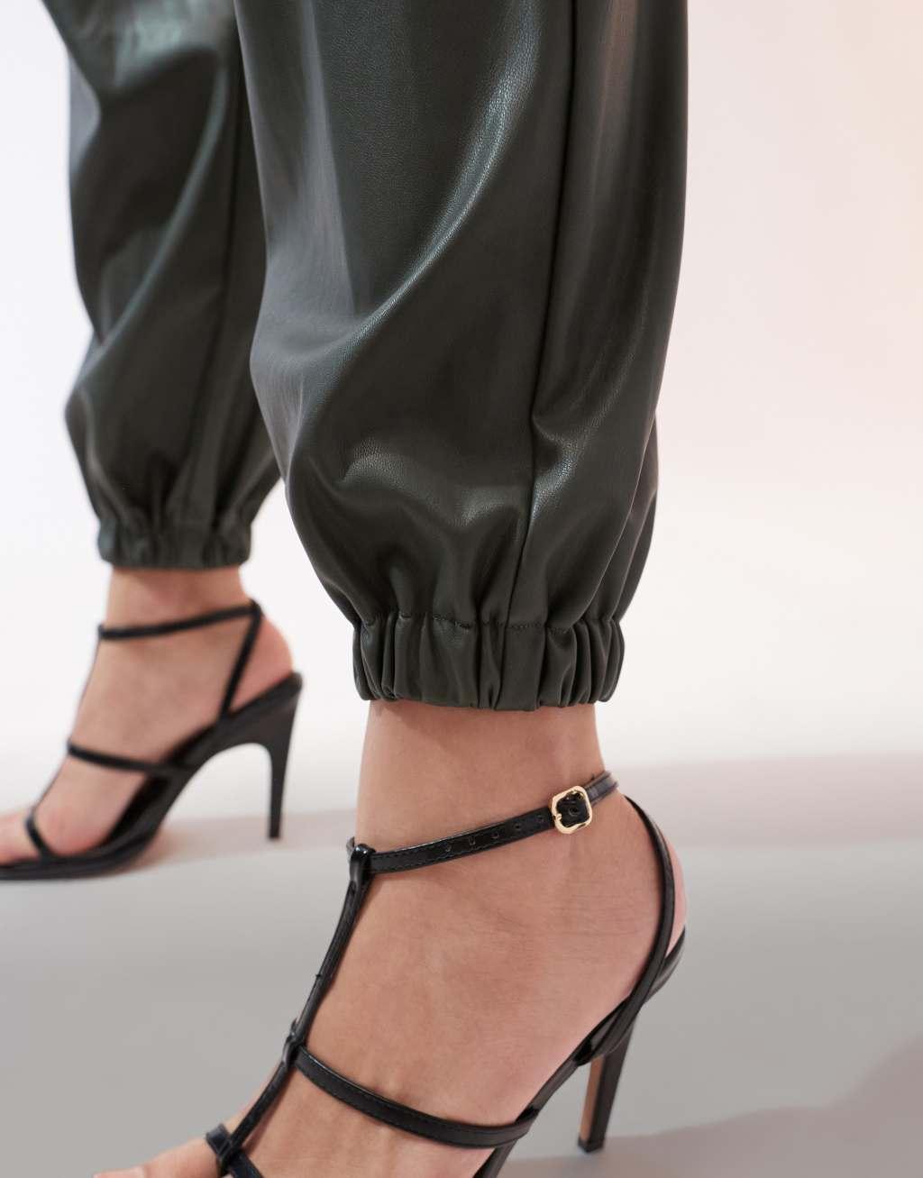 ASOS DESIGN faux leather sweatpants in khaki Product Image