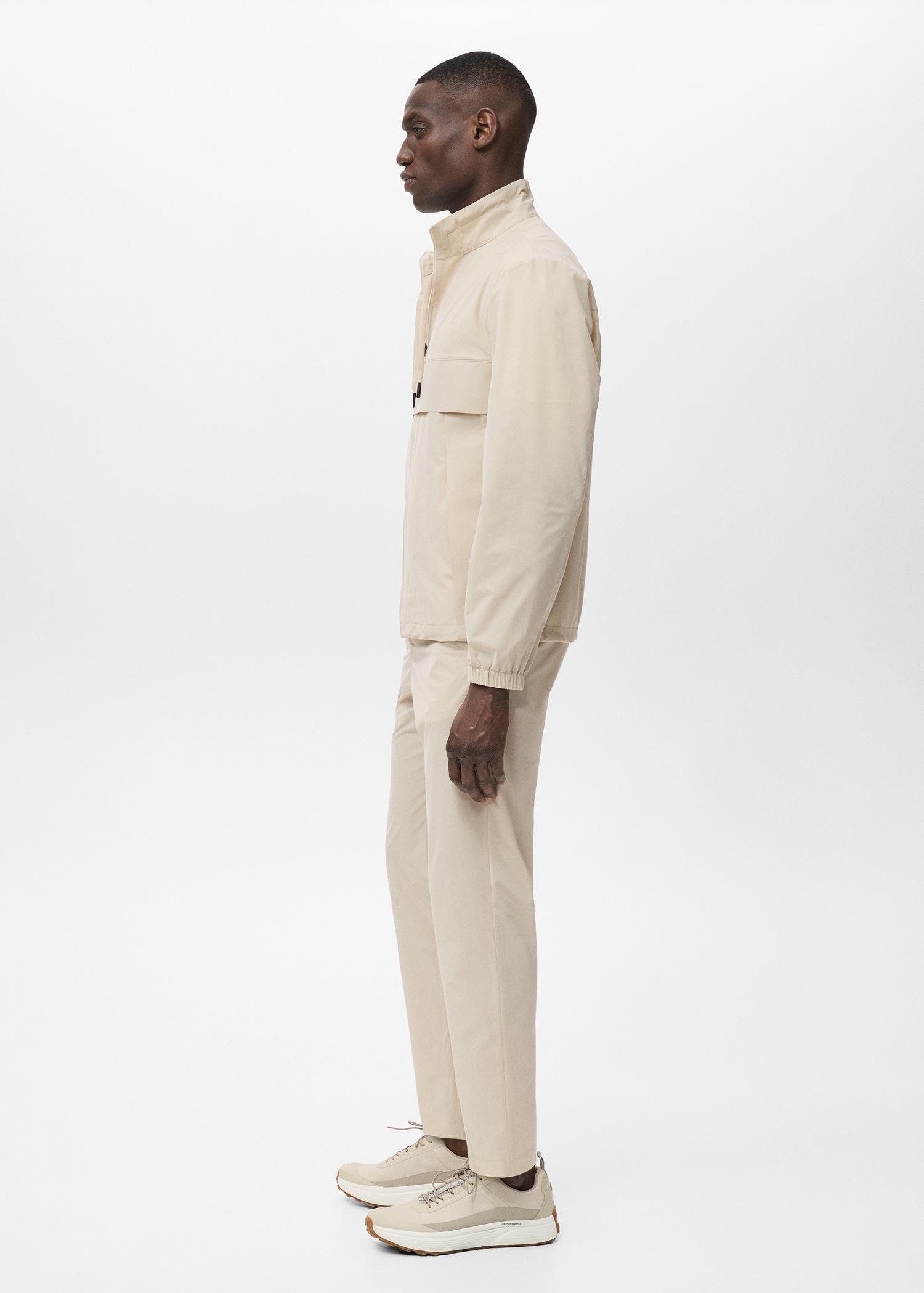 Slim-fit water-repellent pants - Men | MANGO USA Product Image
