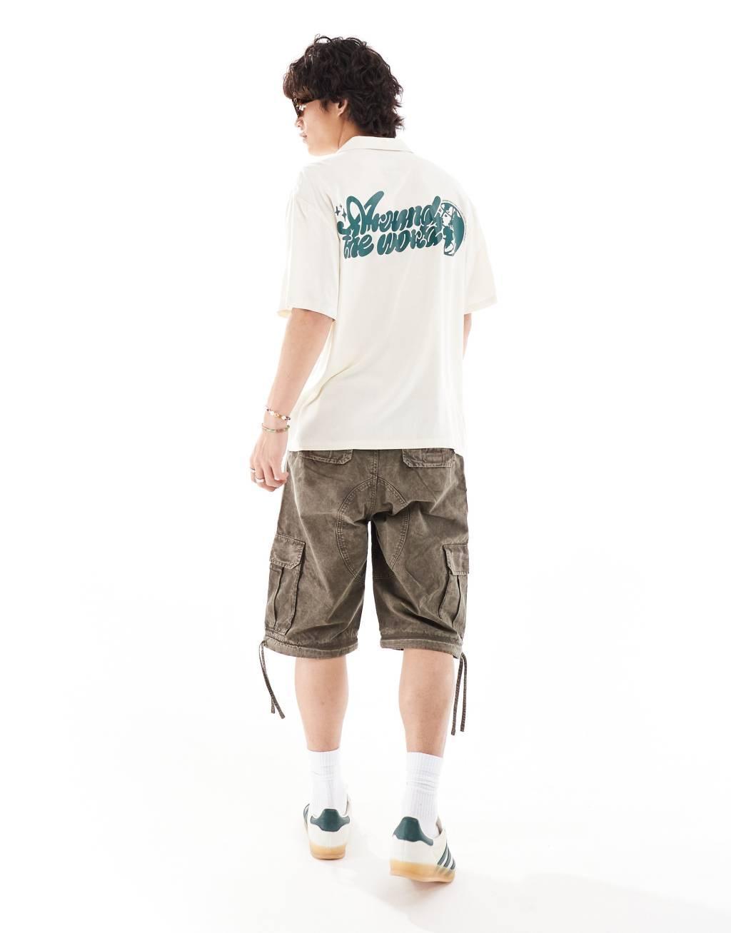 Dr Denim Madi short sleeve relaxed fit summer shirt with world back graphic print in ecru exclusive to ASOS Product Image