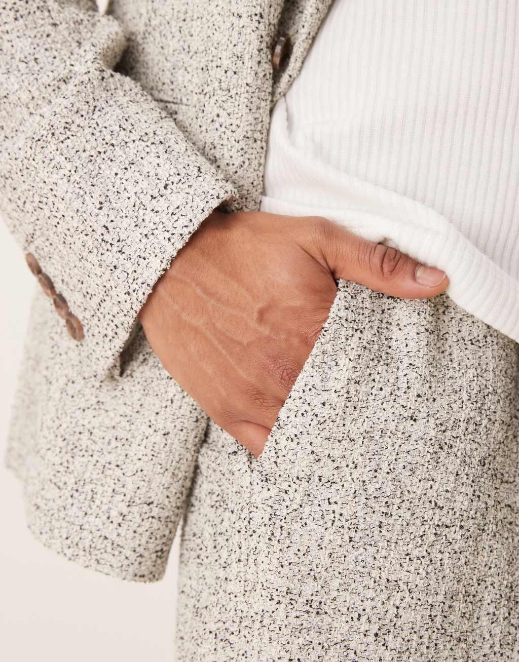 ASOS DESIGN wide leg suit pants in white and black textured fabric Product Image