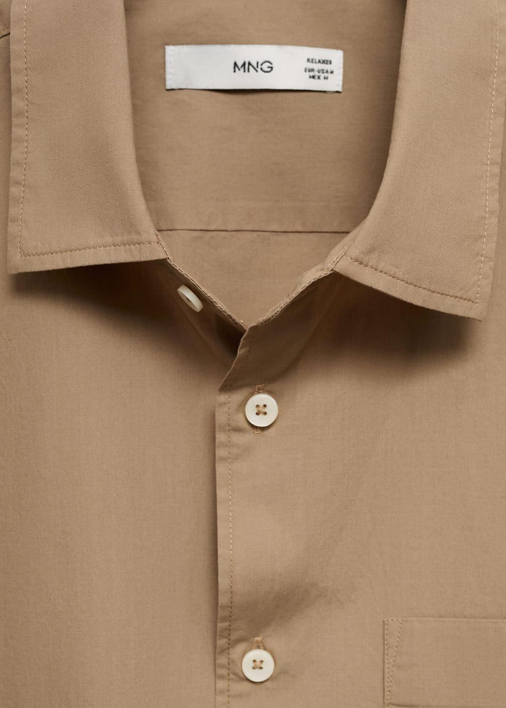 Tencel™™ cotton shirt with pocket - Men | MANGO USA Product Image