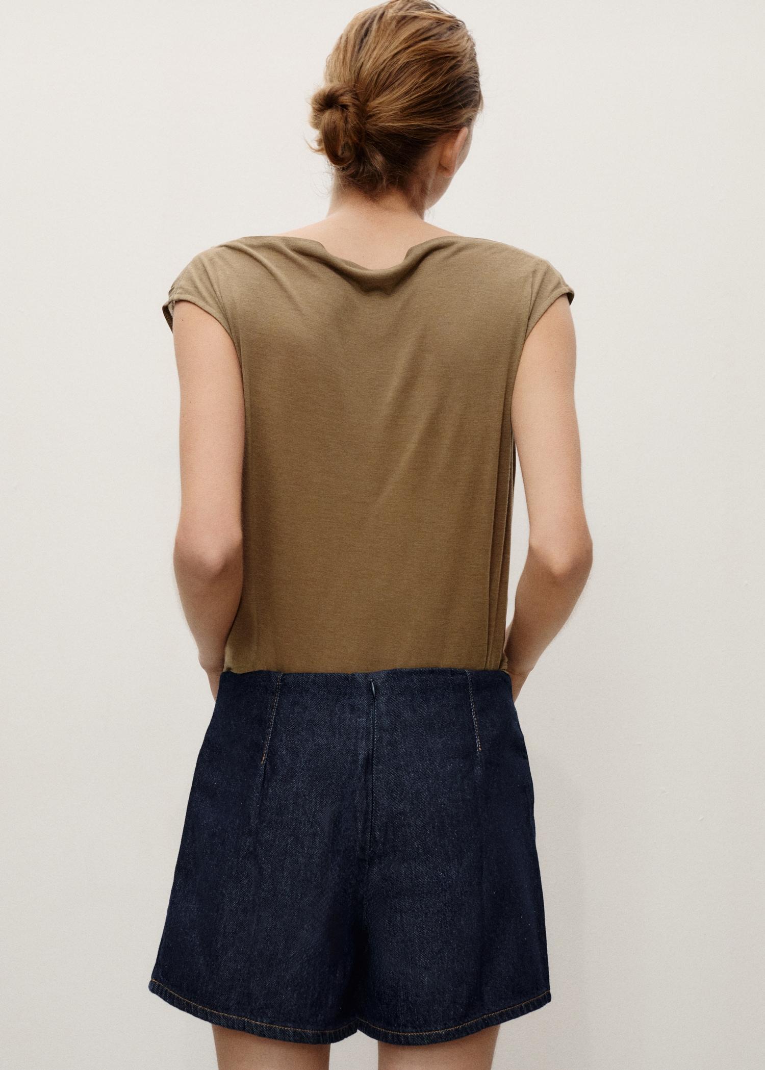 Wrapped denim skort - Women | MANGO USA Product Image