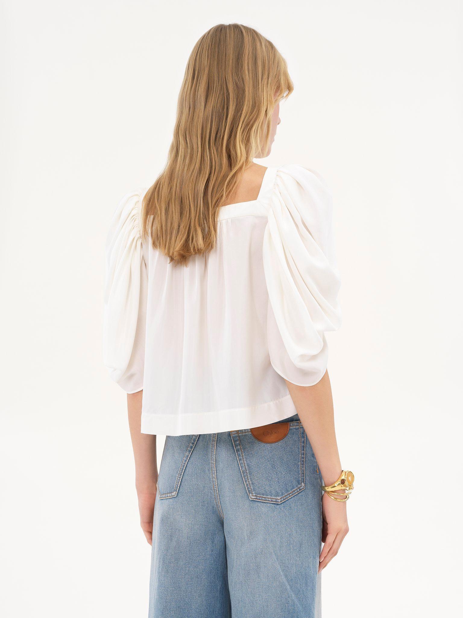 Puff-sleeve pleated top in silk poplin Product Image