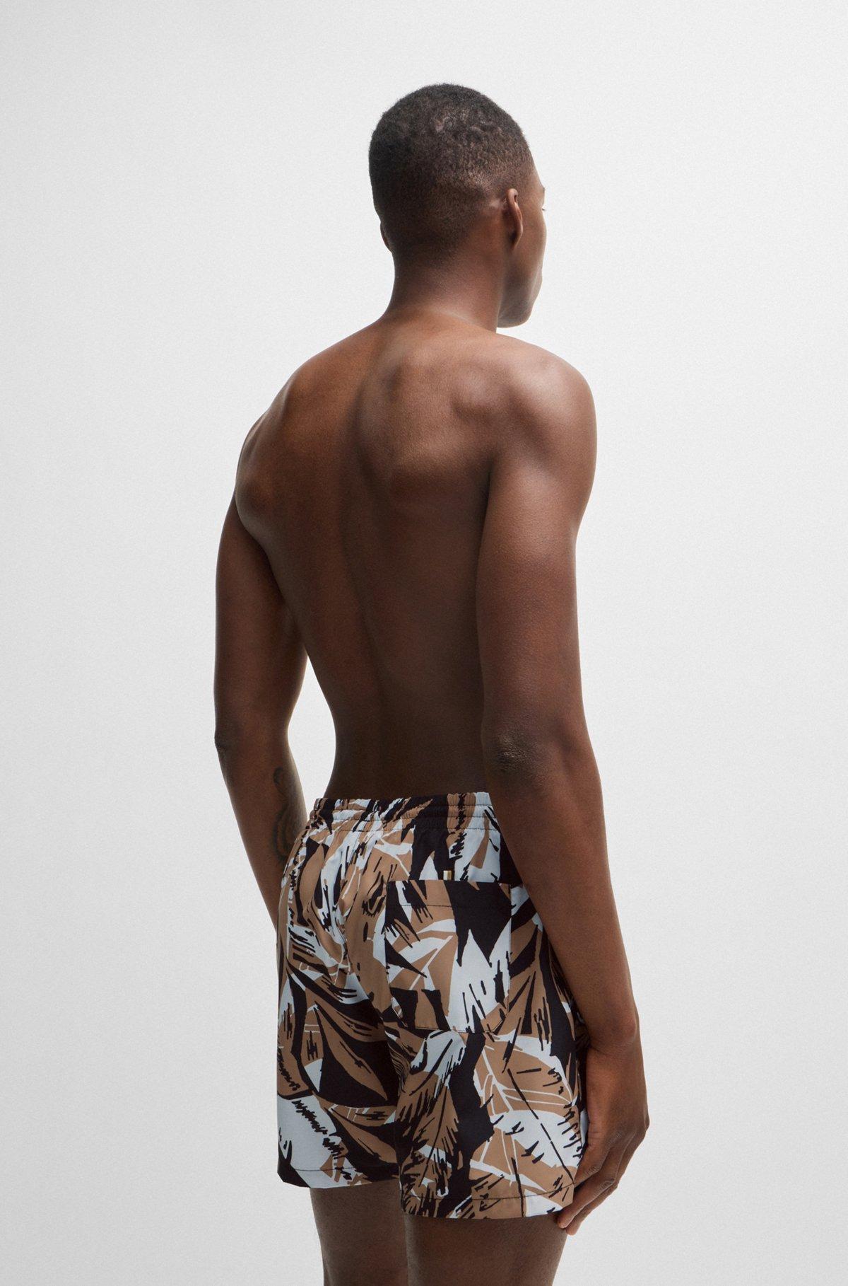 Fully lined swim shorts with seasonal print Product Image