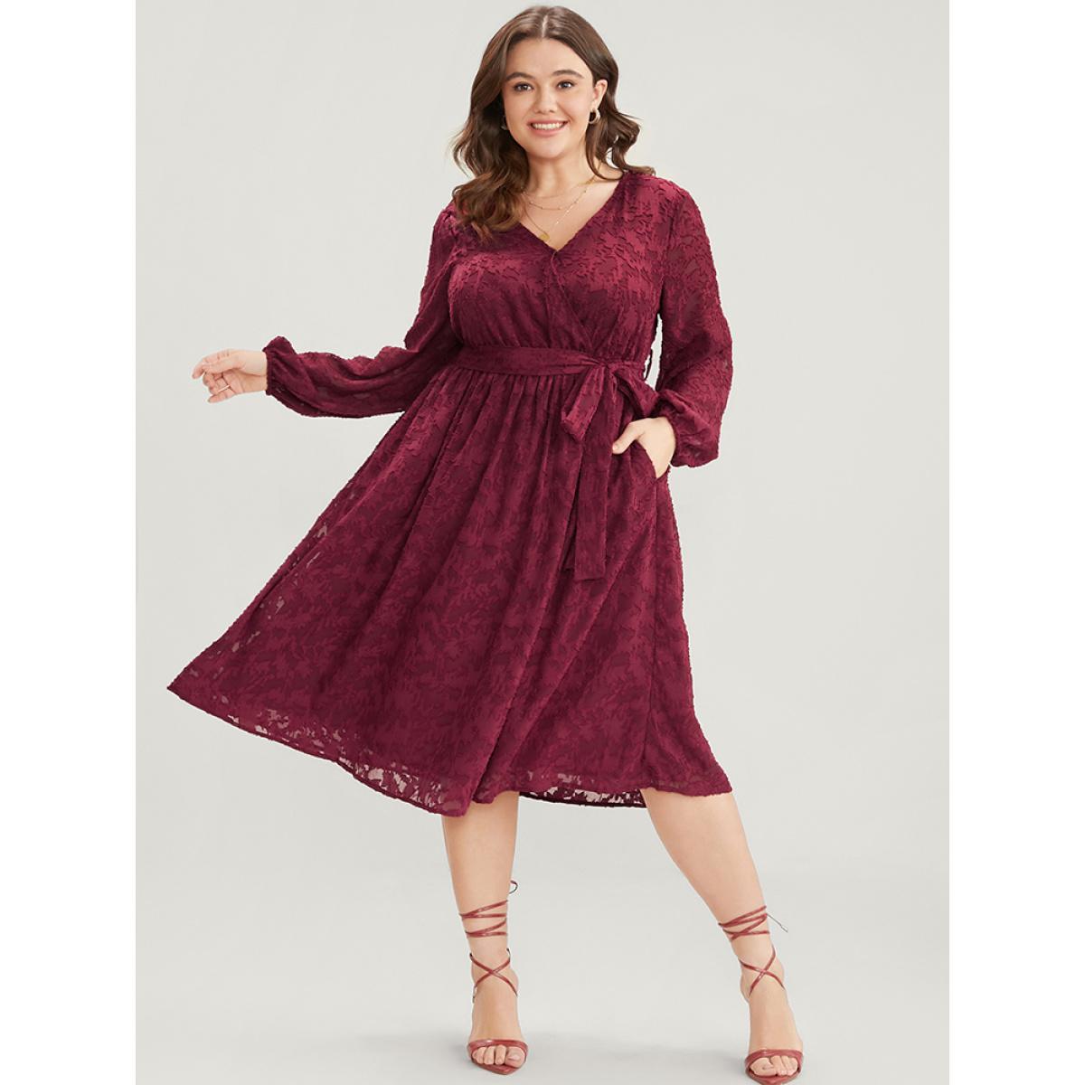 Plus Size Floral Pocket Lantern Sleeve Belted Surplice Neck Dress Scarlet Women Glamour Belted V-neck Long Sleeve Curvy Midi Dress BloomChic 26/4X Product Image