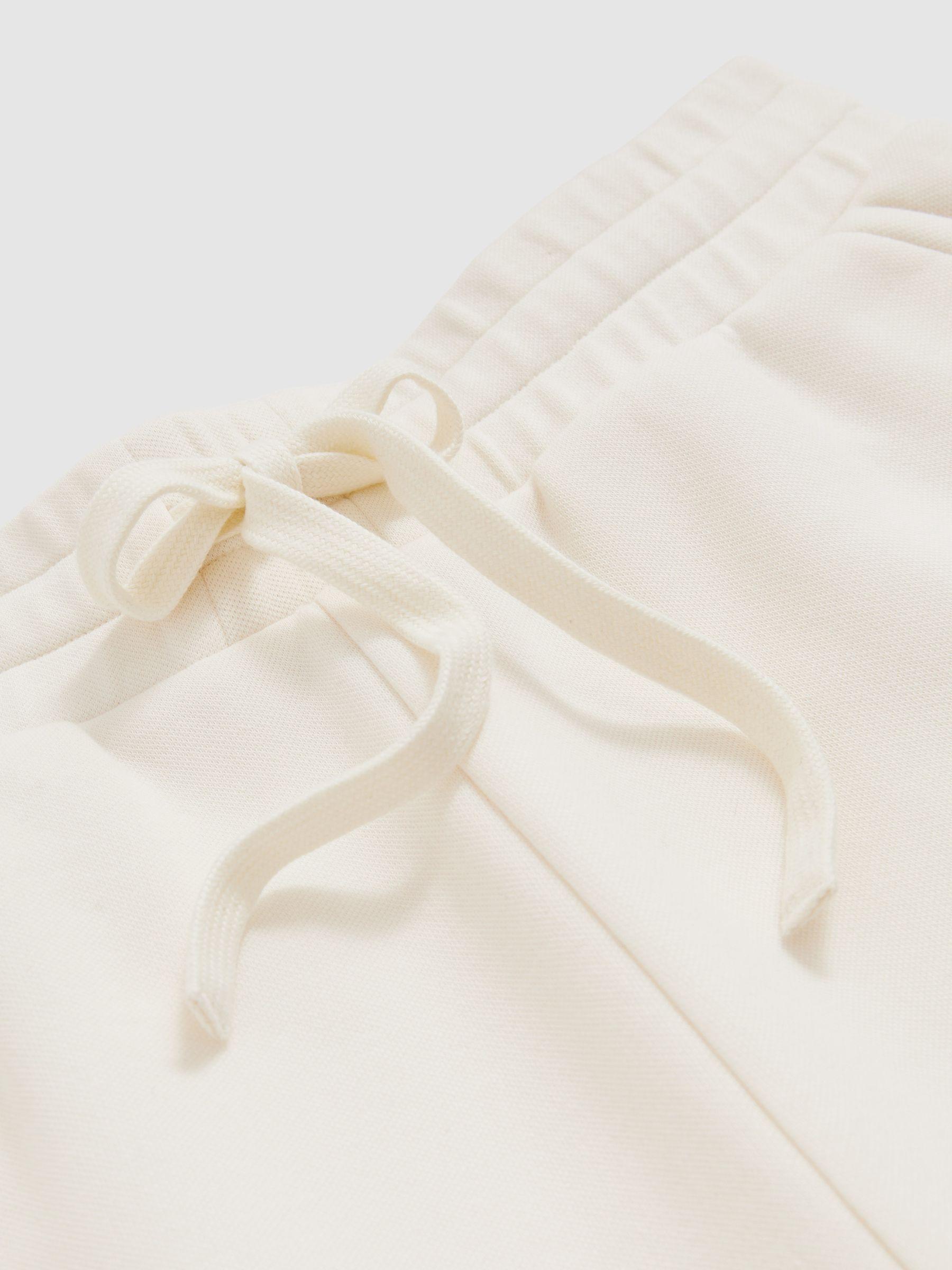Cotton-Blend Interlock Wide-Leg Joggers in Ivory Product Image