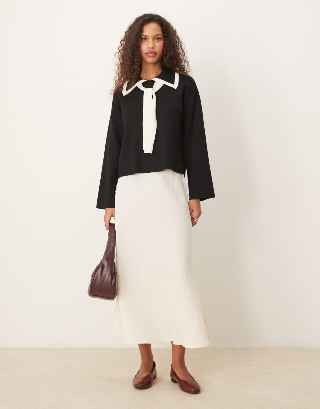 YAS bow neck long sleeve knit top in black Product Image
