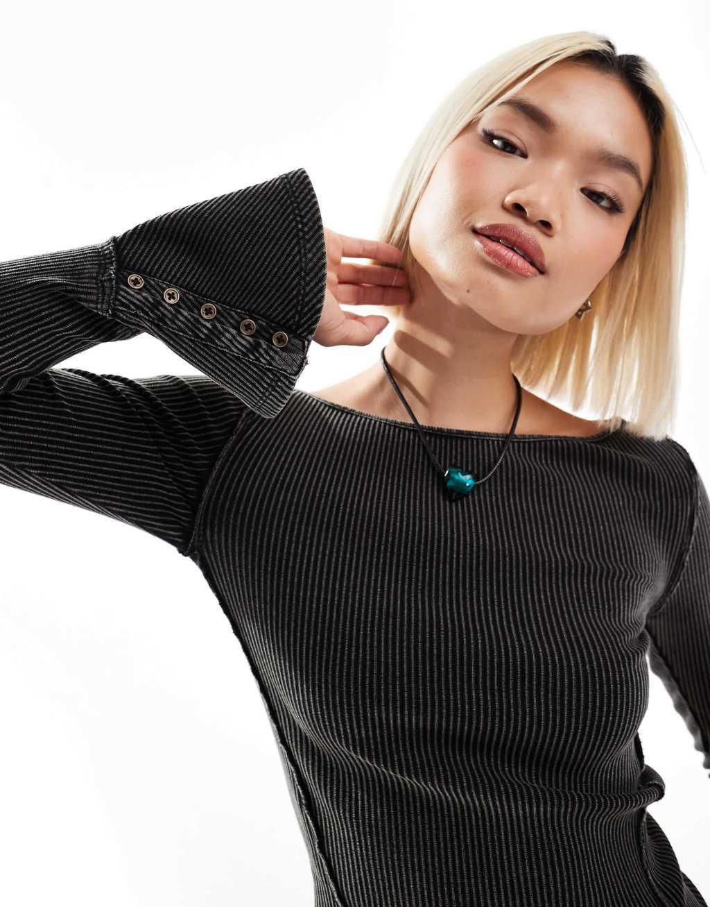 Free People ribbed boat neck long sleeve top in washed black Product Image