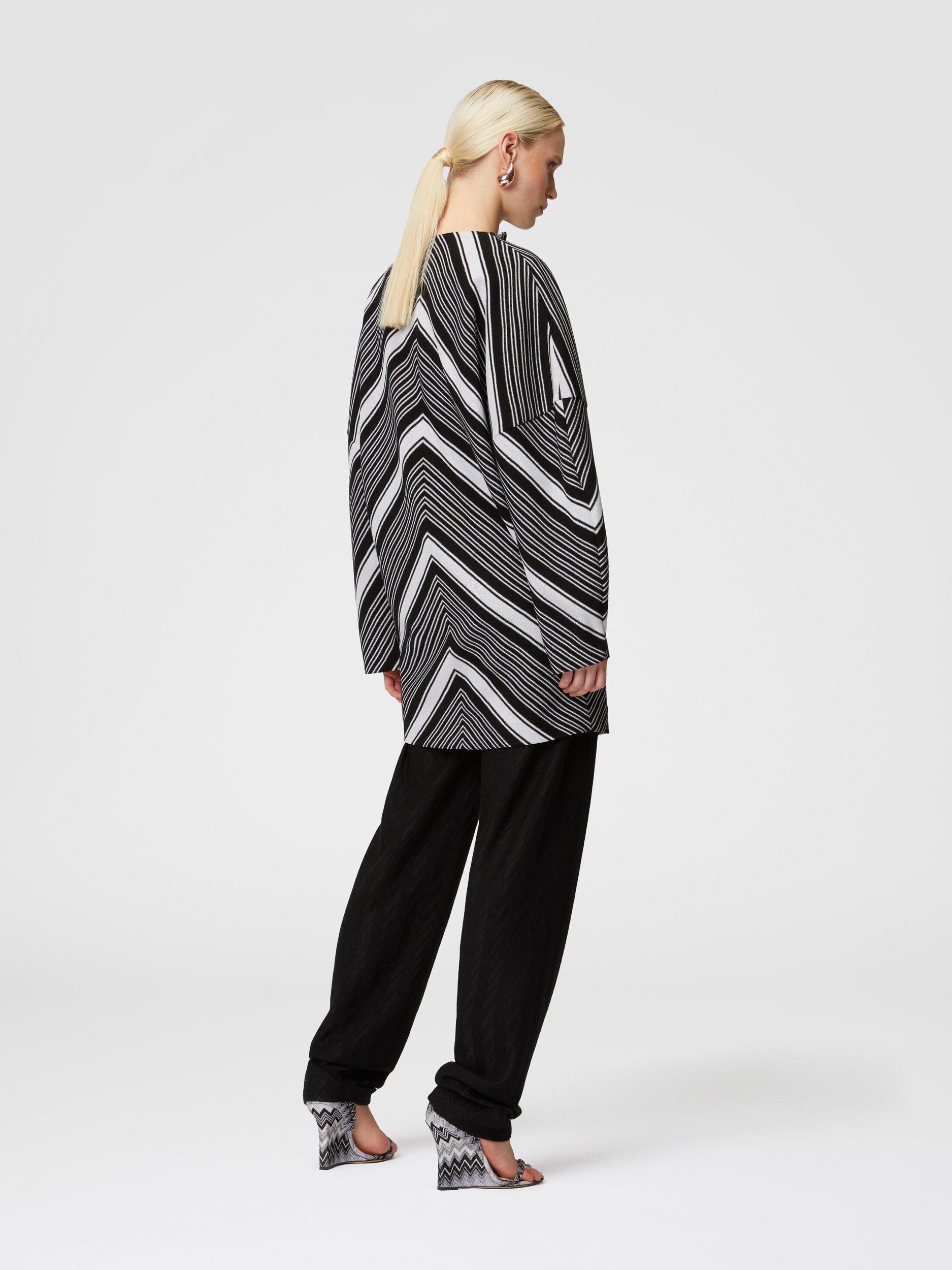 Mini-dress with oversized sleeves and plunging V-neckline Product Image