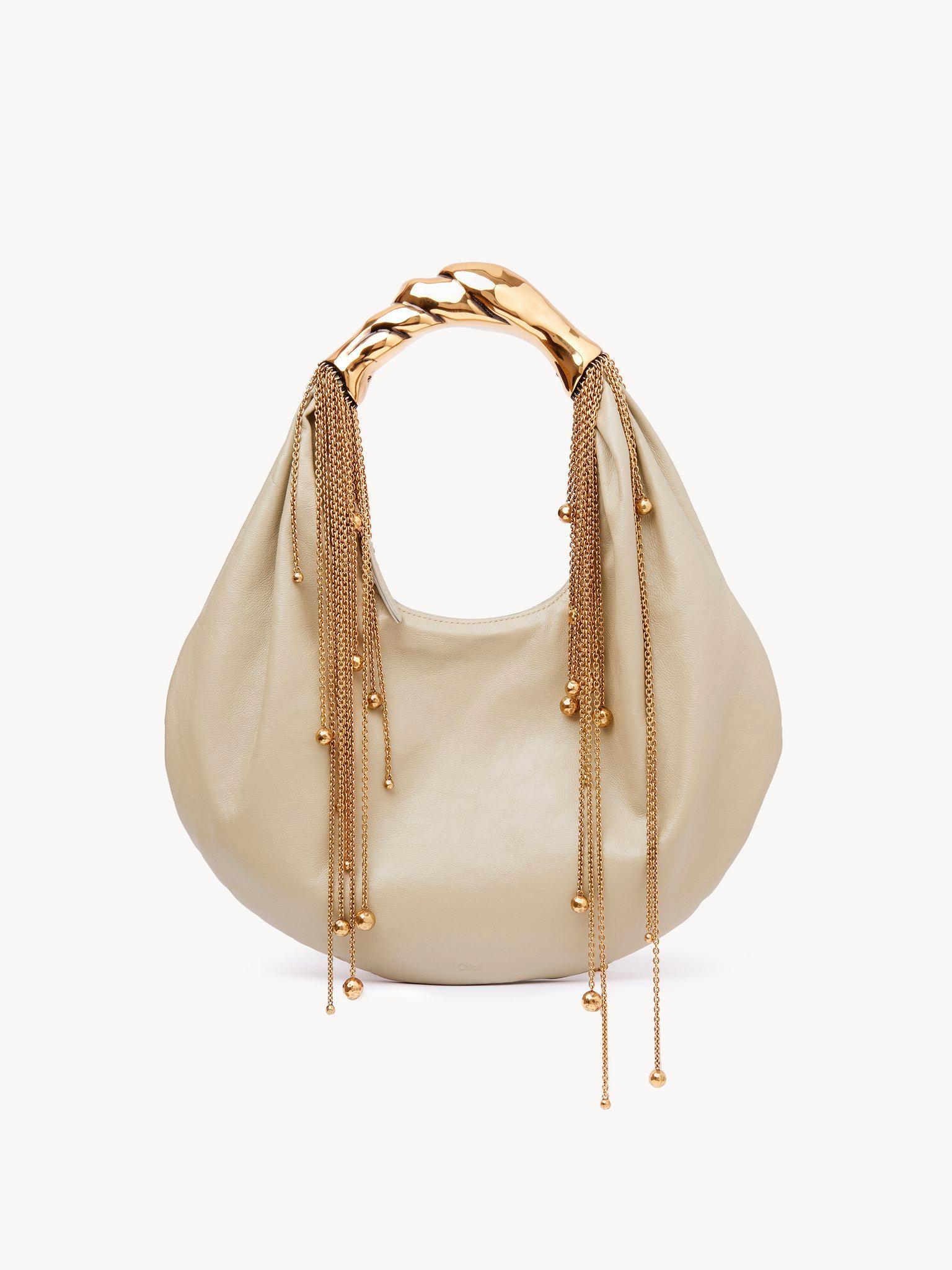 Twisted Shell hobo bag in shiny leather  Product Image