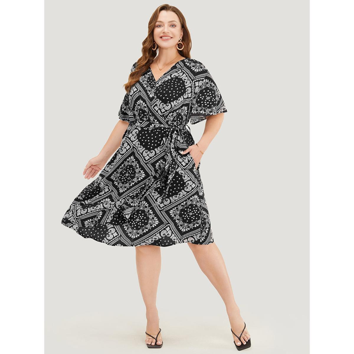 Plus Size Paisley Print Pocket Belted Wrap Flutter Sleeve Dress BlackFlower Women Vacation Wrap V-neck Short sleeve Curvy Knee Dress BloomChic 10/M Product Image