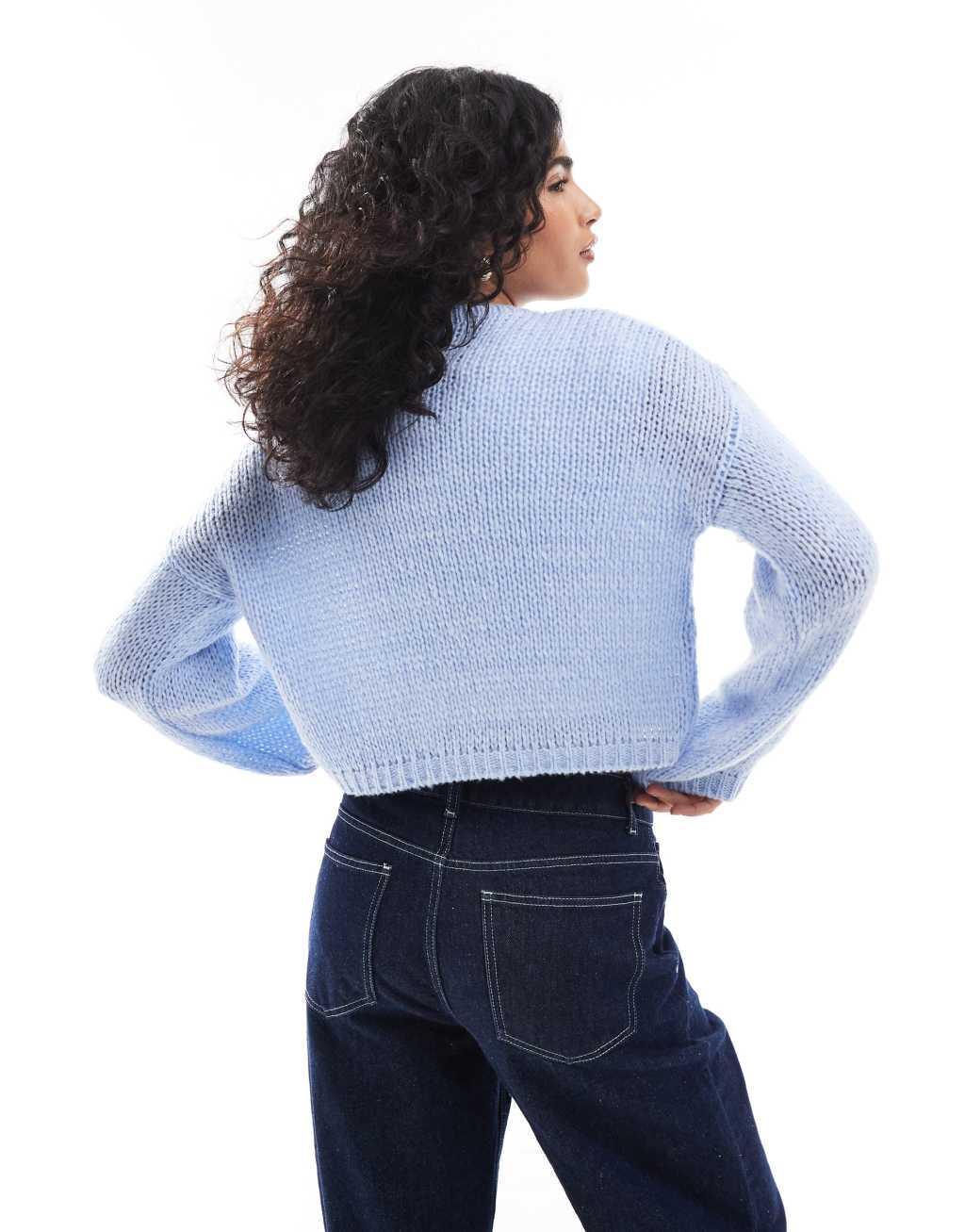 ASOS DESIGN loose knit crew neck cardigan in blue Product Image