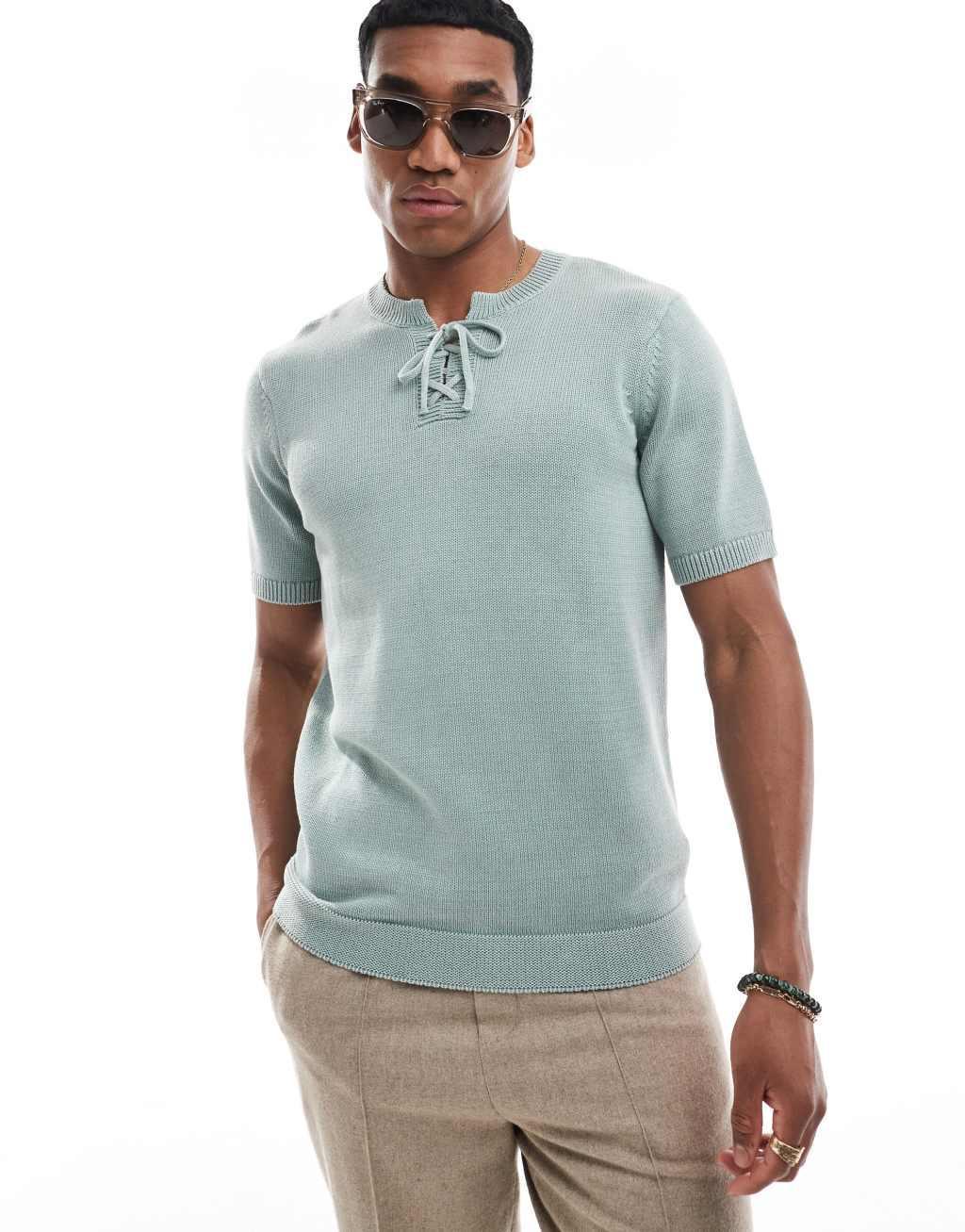 ASOS DESIGN washed knitted t-shirt in blue with lace up detail Product Image