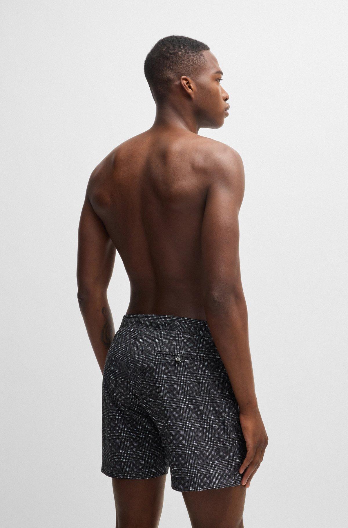 Quick-dry swim shorts with monogram print Product Image