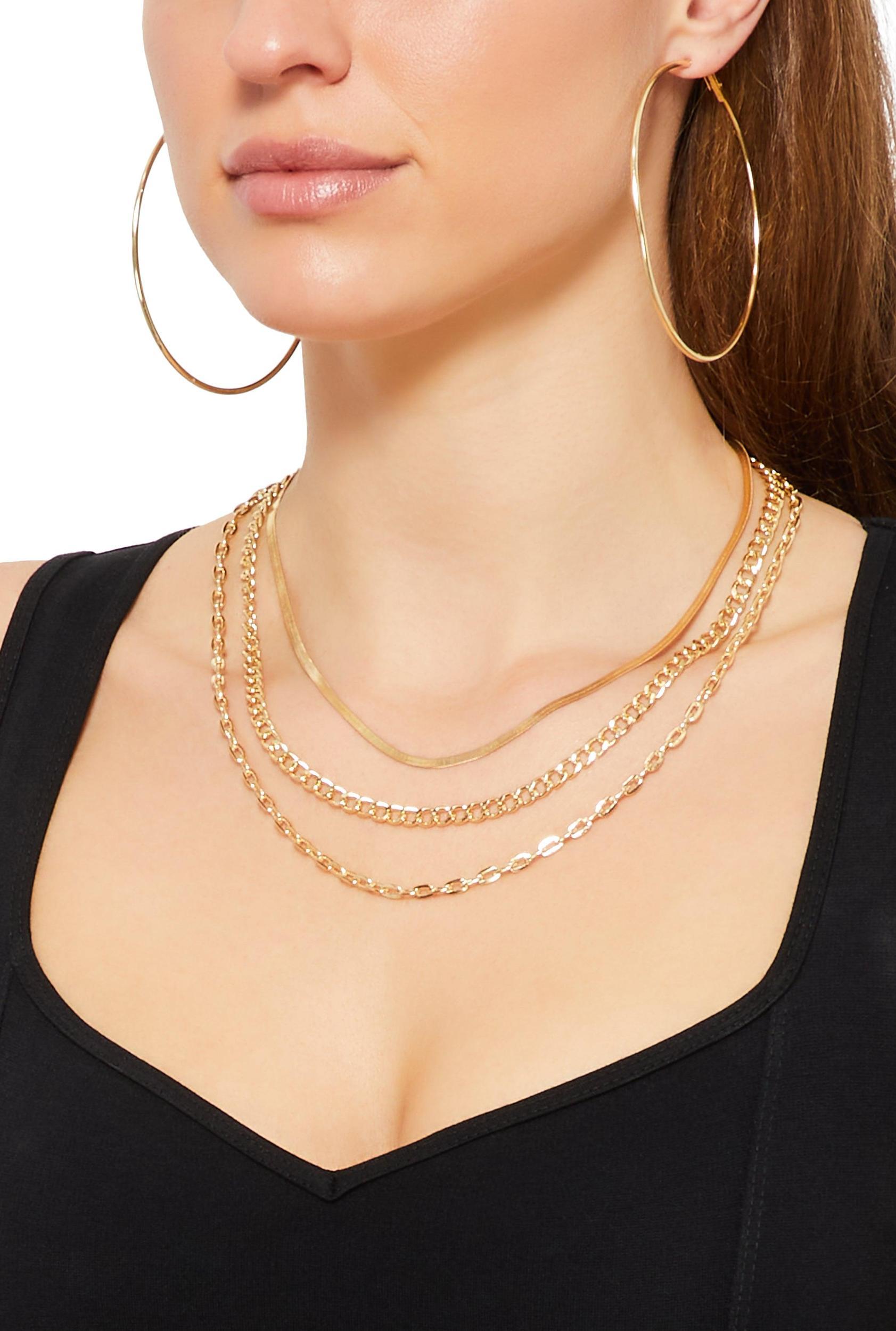 Layered Chain Necklace and Hoop Earrings Female Product Image