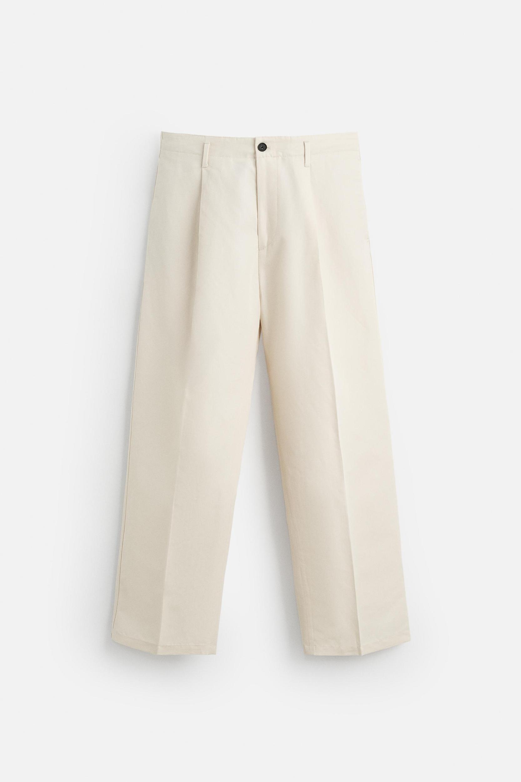 PLEATED SUIT PANTS Product Image