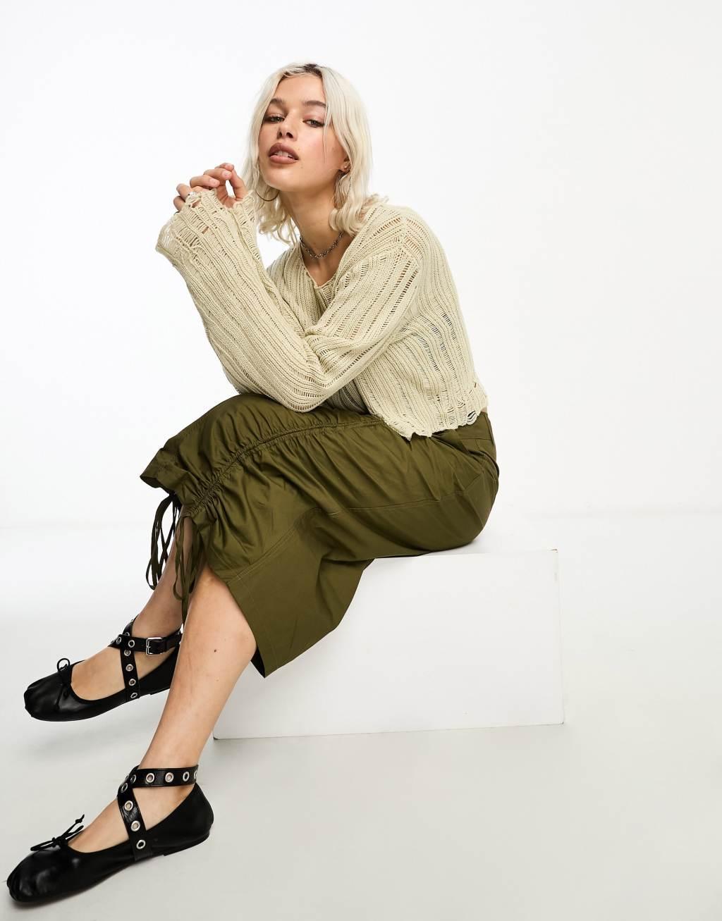 COLLUSION cropped distressed nibbled hem sweater Product Image