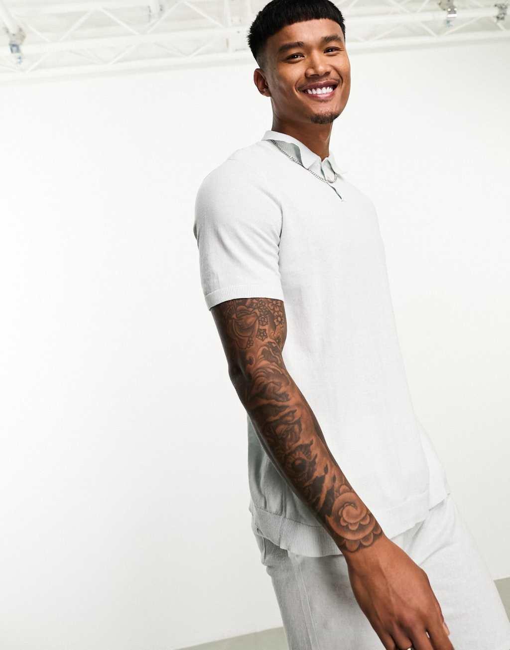 ASOS DESIGN lightweight knit cotton polo in blue Product Image