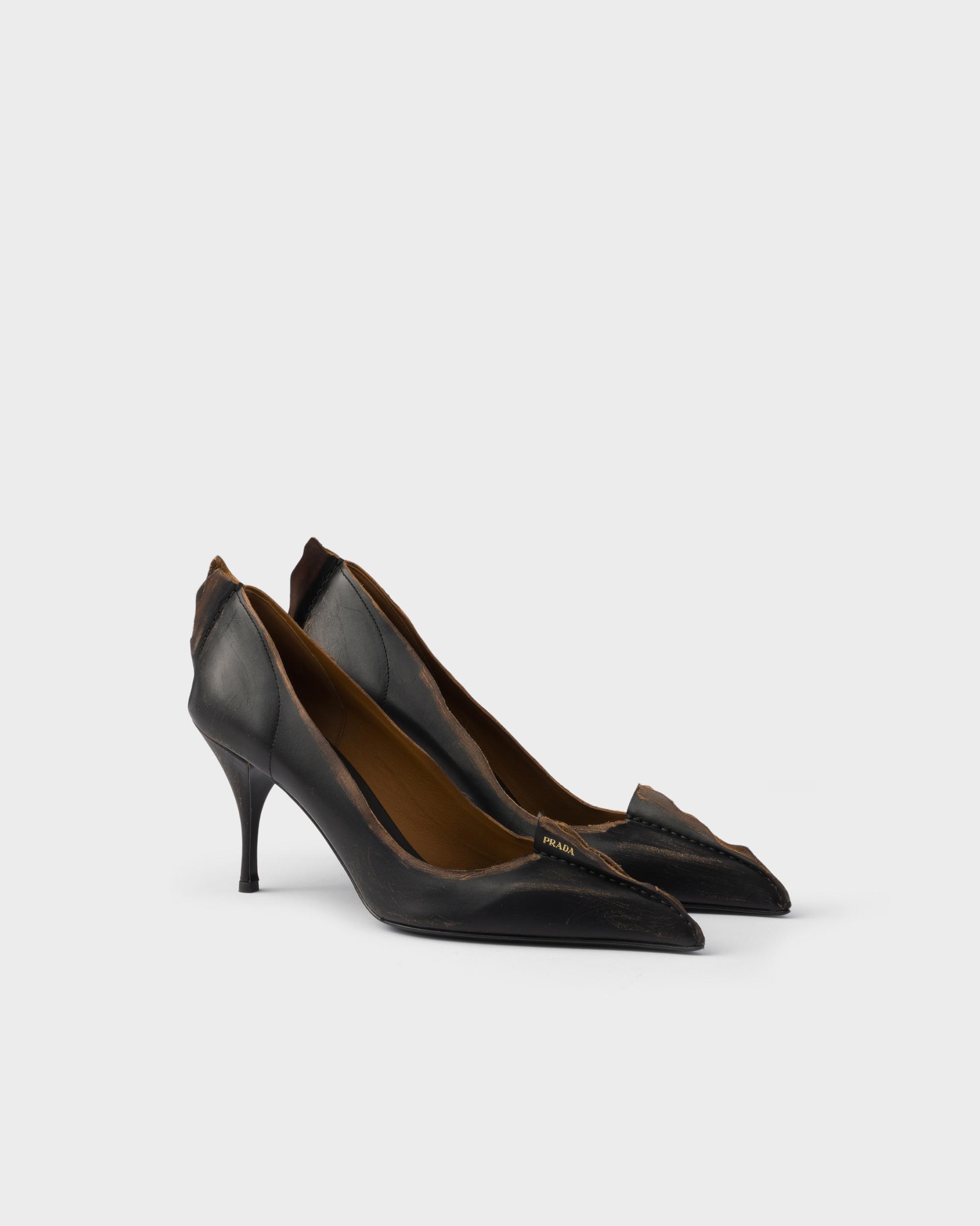 Antiqued leather pumps Product Image