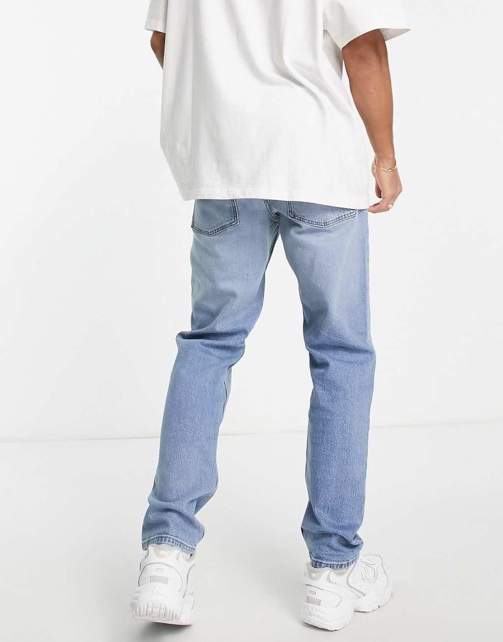 ASOS DESIGN stretch slim jeans in vintage light wash blue  Product Image