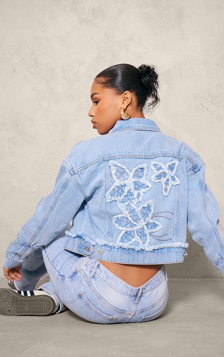 Light Blue Wash Distressed Flower Detail Denim Jacket Product Image