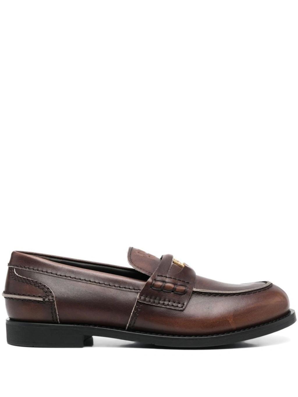 MIU MIU Leather Distressed Penny Loafers In Brown Product Image