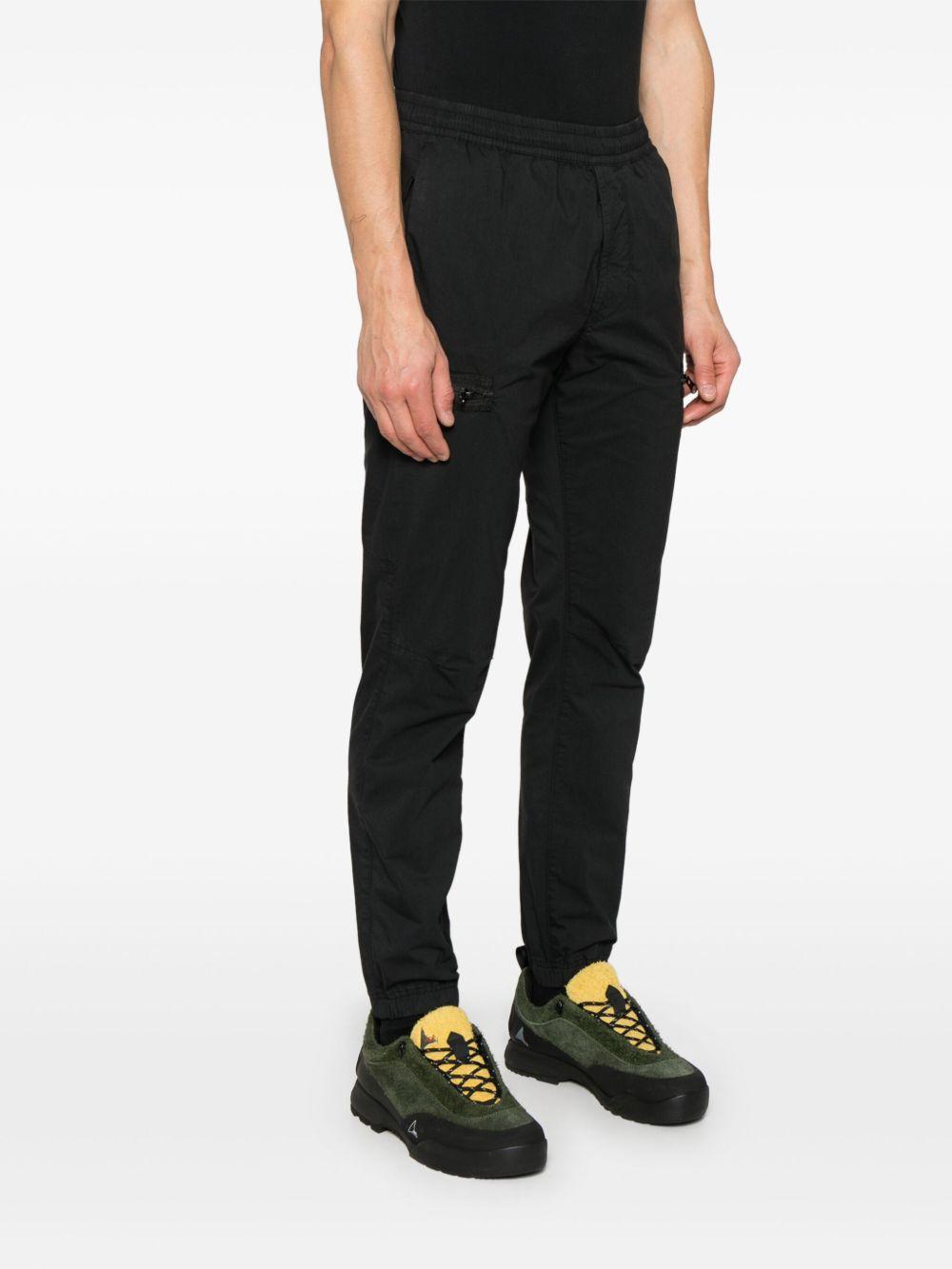 Compass-badge trousers Product Image