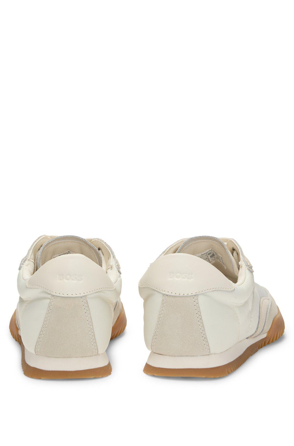 Low-top trainers in fabric and suede Product Image