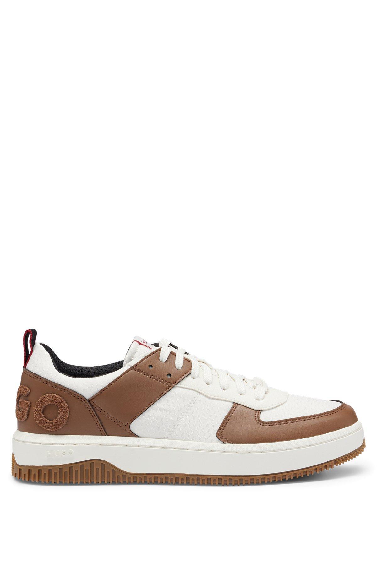 Basketball-inspired sneakers with large logo Product Image