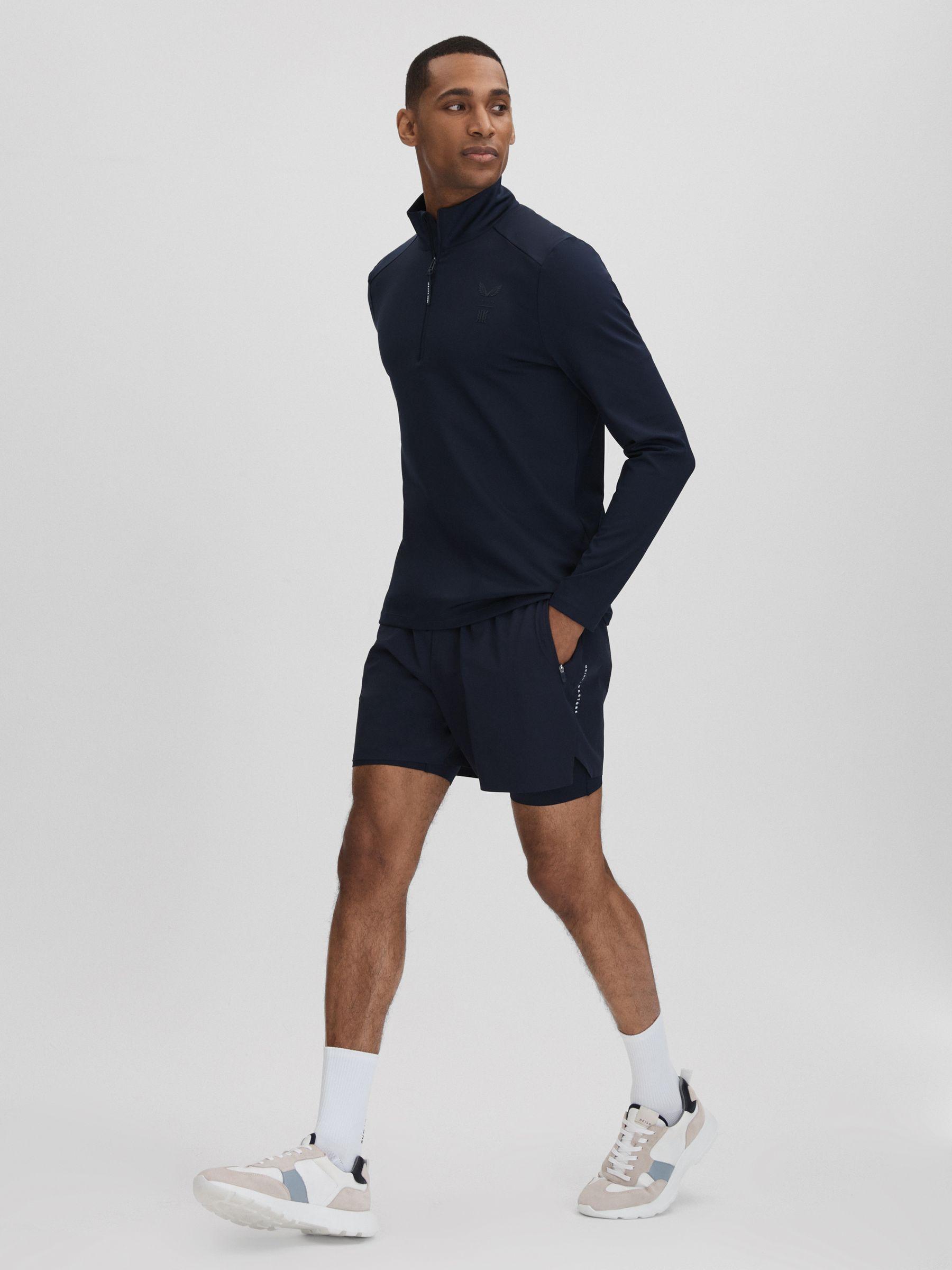 Castore Performance Quarter-Zip Funnel Neck Top in Midnight Navy Product Image