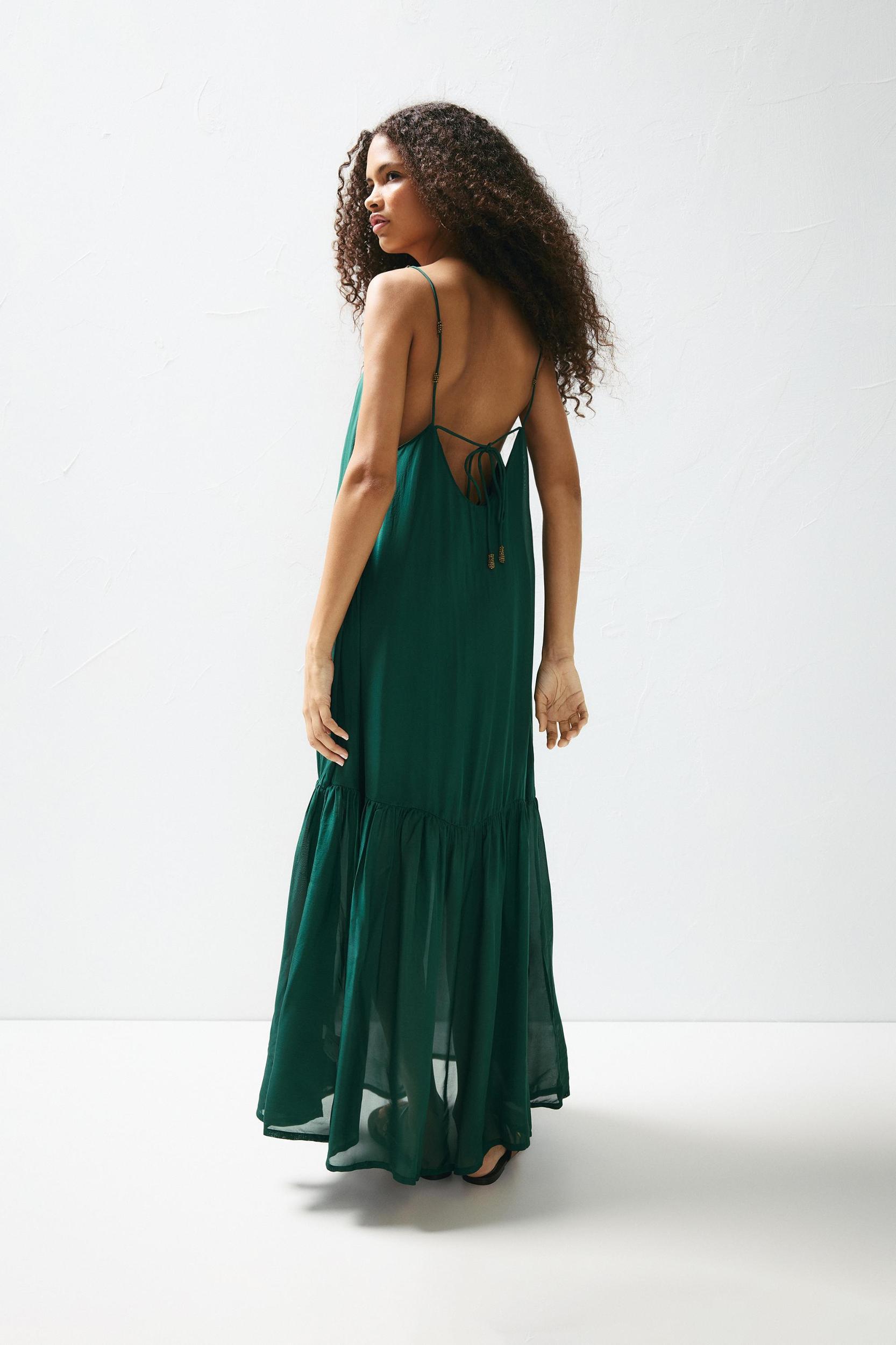 Strappy beaded midi dress Product Image