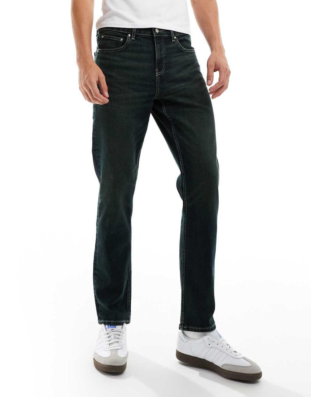ASOS DESIGN slim jeans in washed black with green tint Product Image