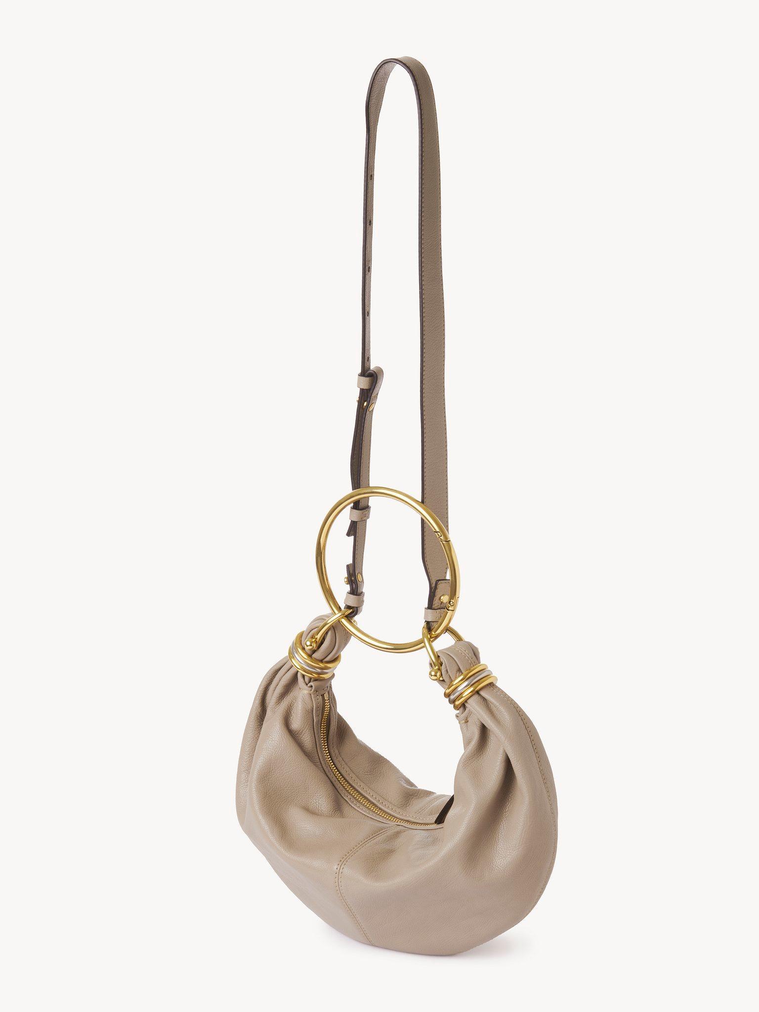 Small Bracelet hobo bag in grained leather Product Image