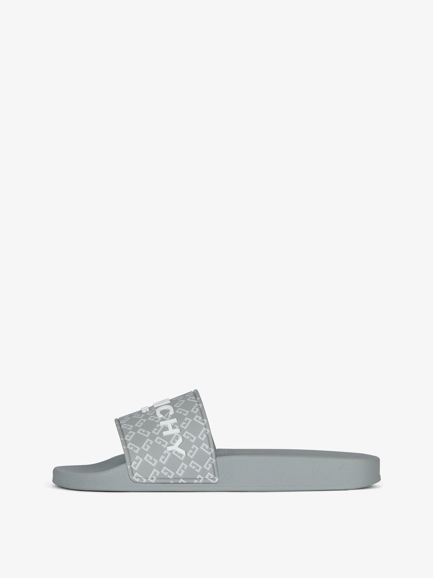 Slide flat sandals in monogram 72 rubber Product Image