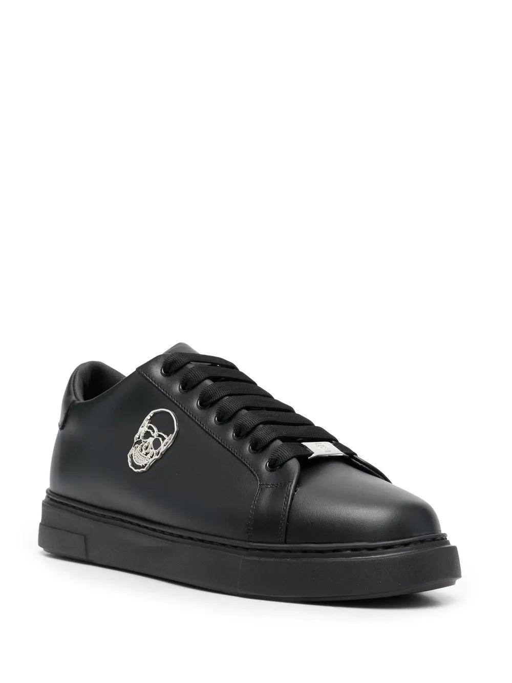 Skull-plaque low-top sneakers Product Image