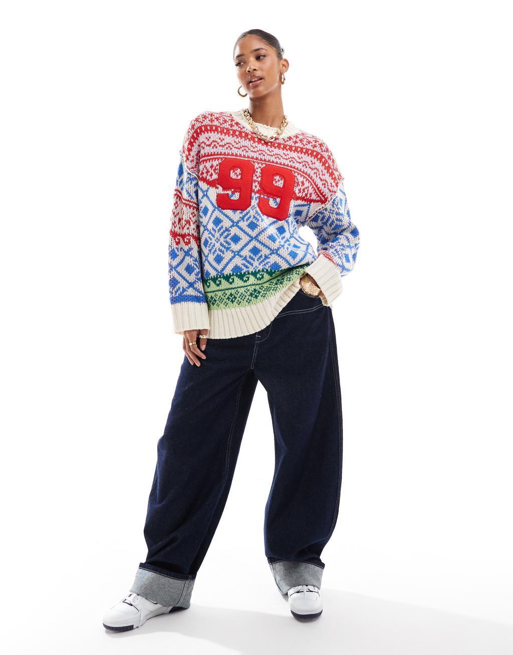 ASOS DESIGN oversized patchwork fairisle festive sweater in blue and red Product Image