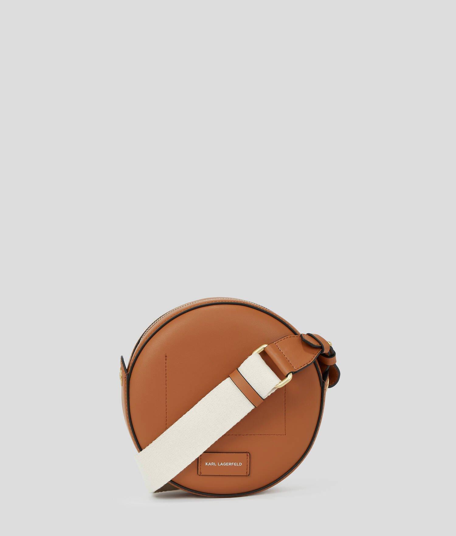 K/CIRCLE ROUND PERFORATED LOGO CROSSBODY BAG Product Image
