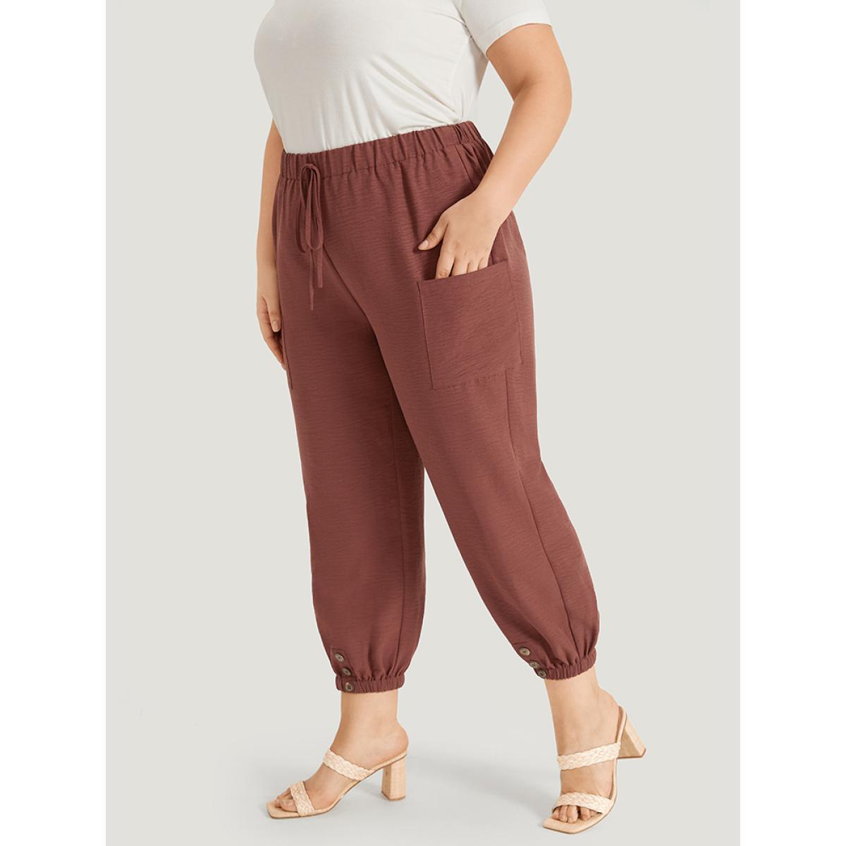Plus Size Solid Patched Pocket Bowknot Button Detail Pants Women Rust Casual High Rise Dailywear Pants BloomChic 26/4X Product Image
