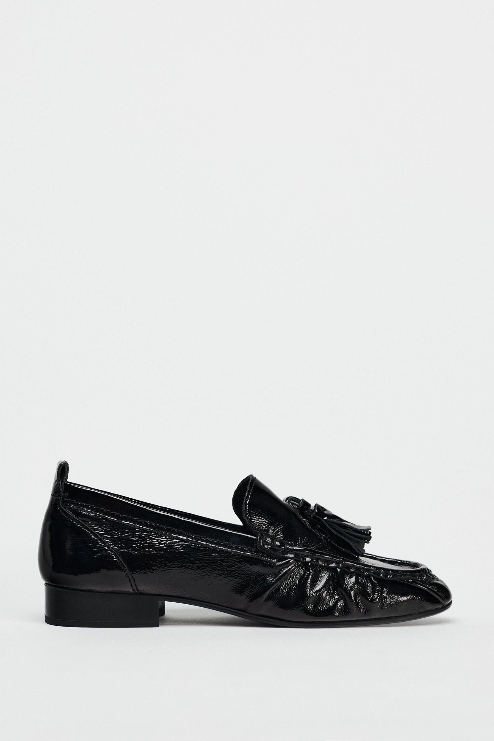 LEATHER TASSELED LOAFERS Product Image