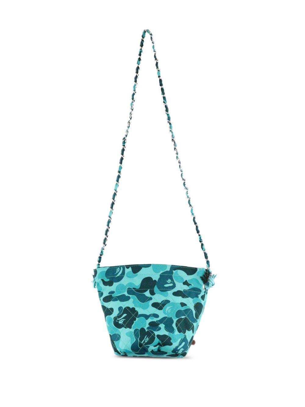 x BAPE camouflage-print bucket bag Product Image