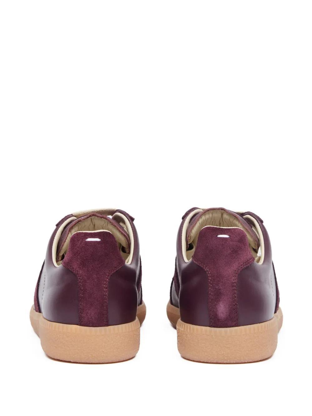 Replica low-top leather sneakers Product Image