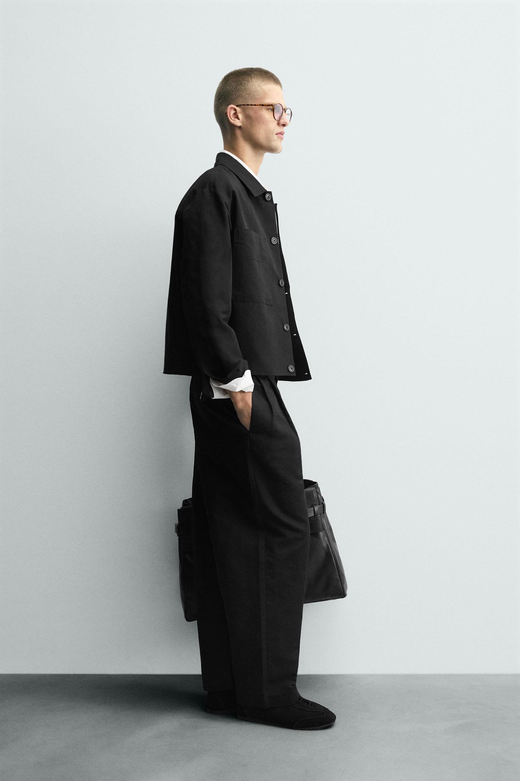 RELAXED FIT PLEATED PANTS Product Image