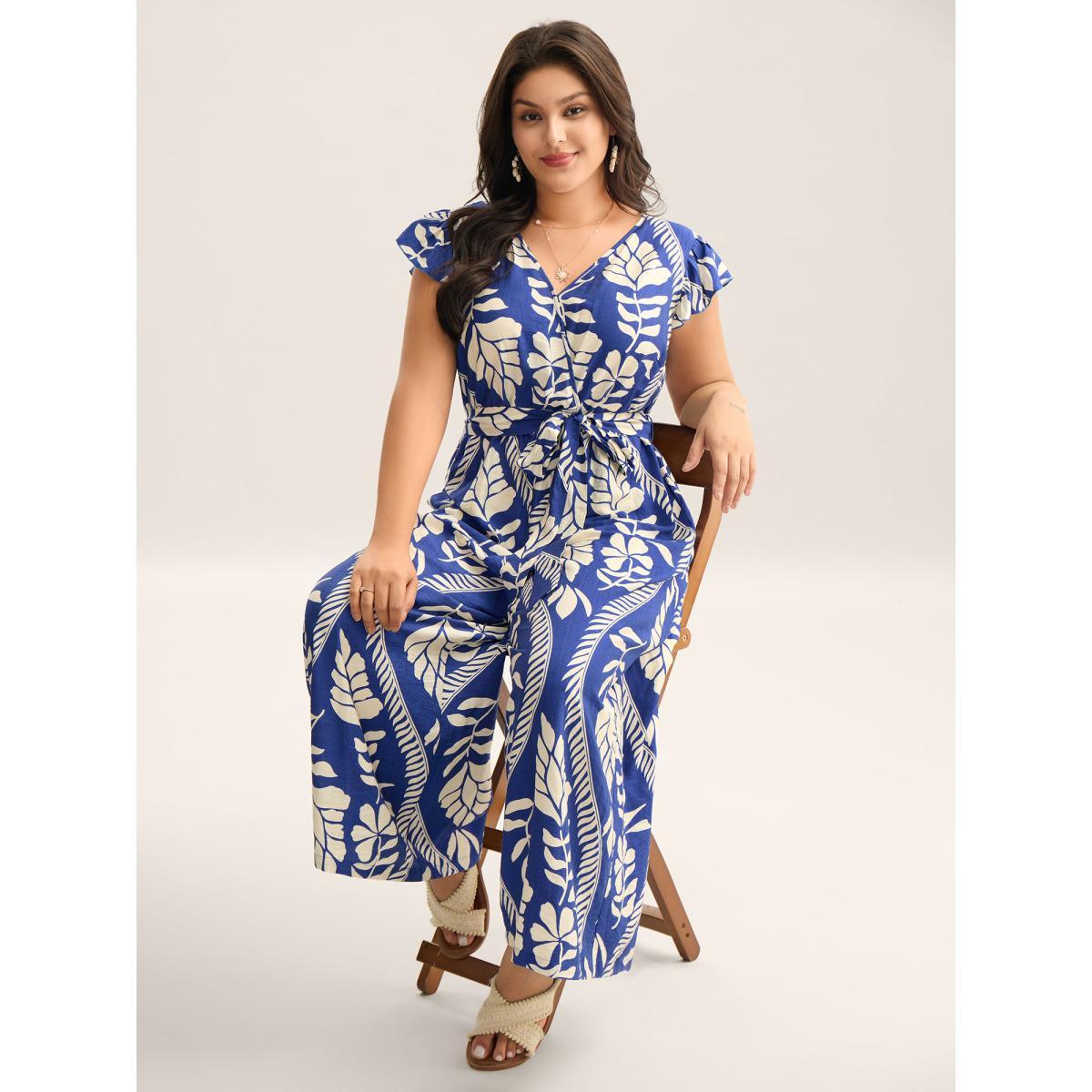 Plus Size Navy Large Floral Print Pockets Jumpsuit Women Cap Sleeve Overlap Collar Vacation Loose Jumpsuits BloomChic 18-20/2X Product Image