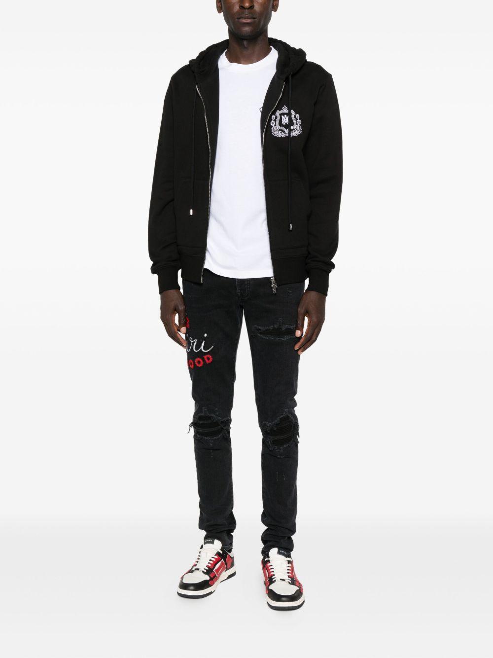 embroidered distressed jeans Product Image