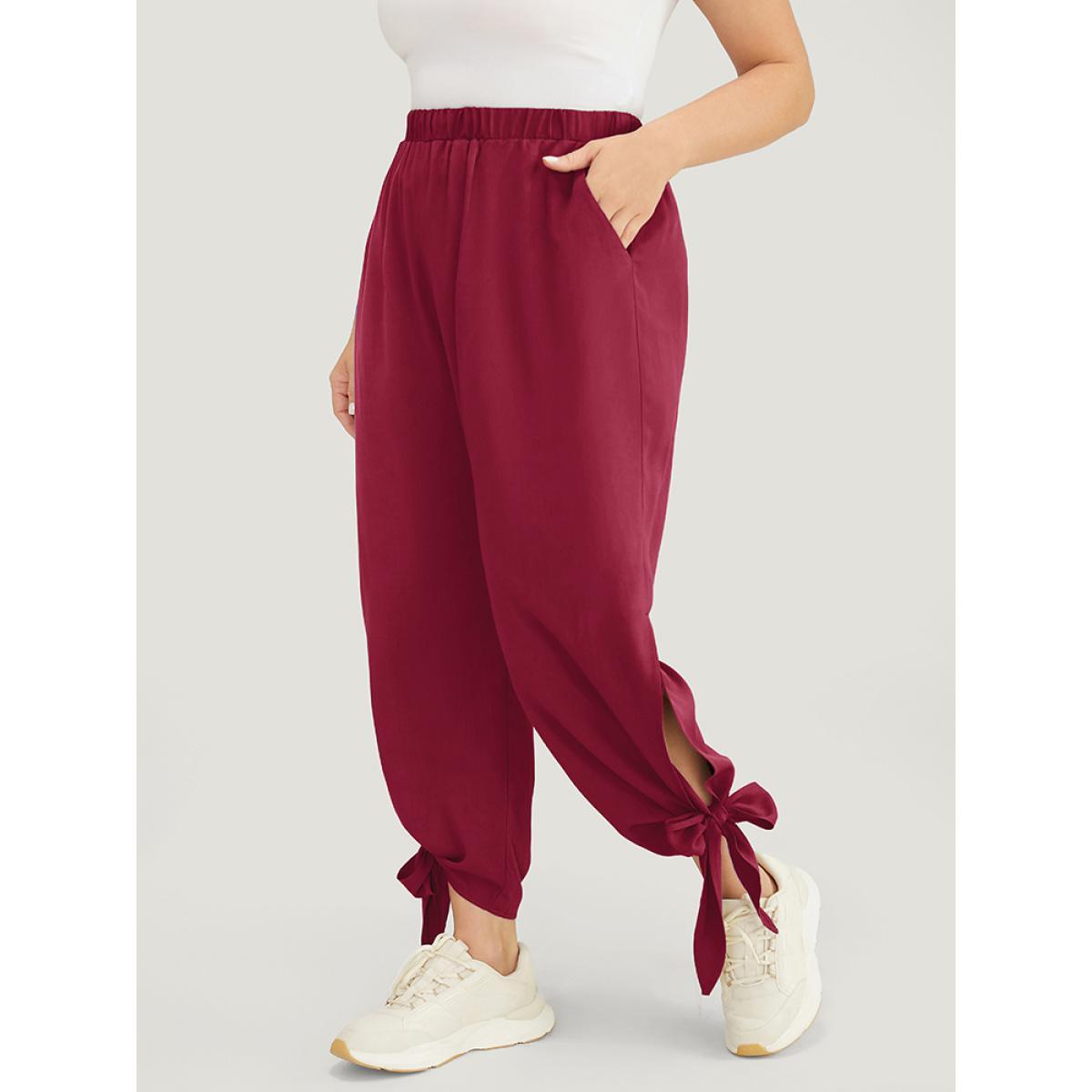Plus Size Solid Knotted Split Hem Pocket Pants Women Scarlet Casual Loose High Rise Dailywear Pants BloomChic 14-16/1X Product Image