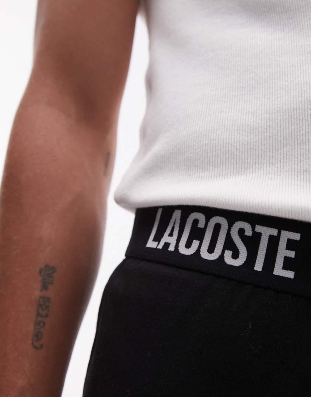 Lacoste loungewear pants in black with waistband taping Product Image
