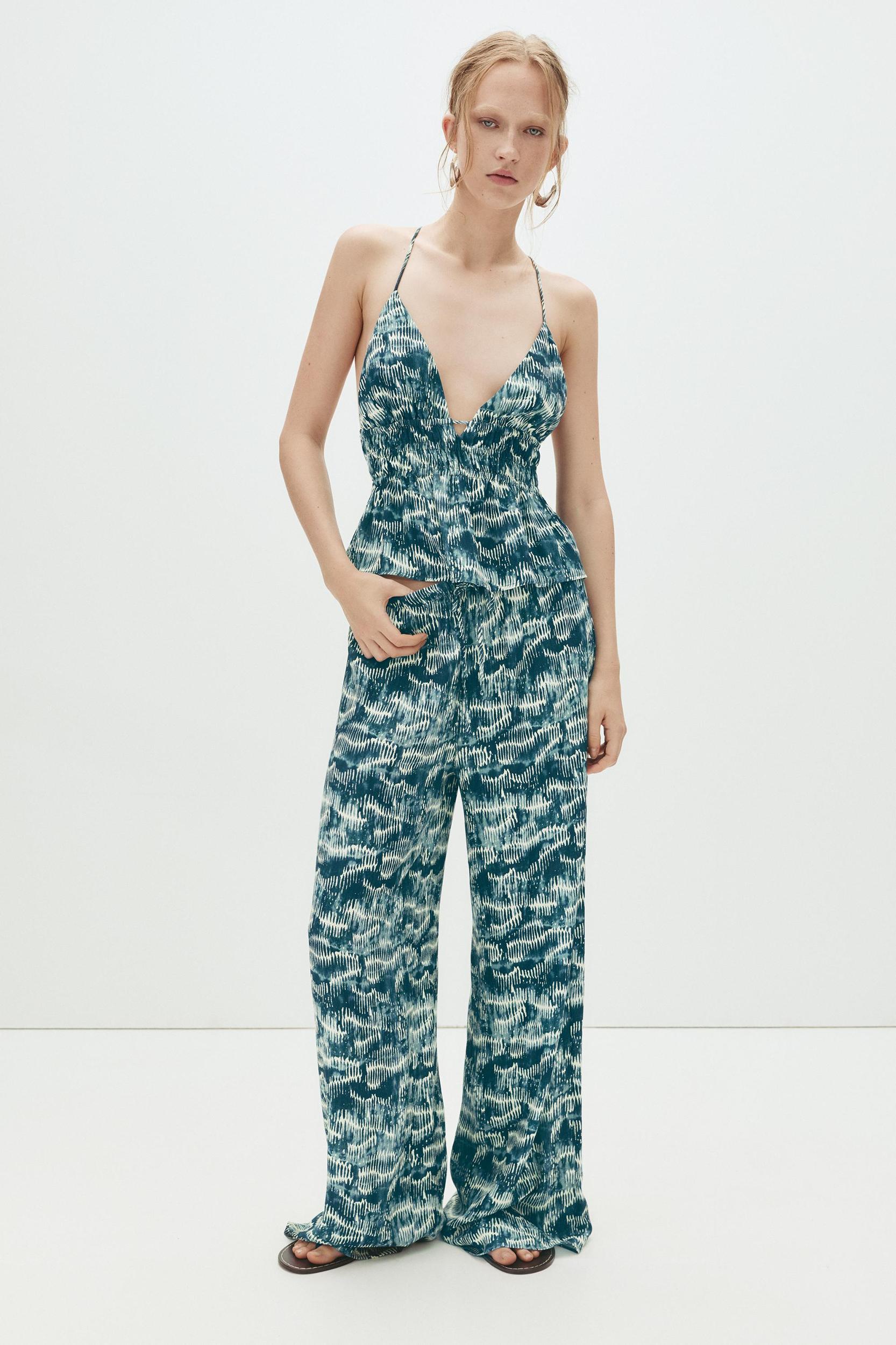 Loose-fitting printed trousers Product Image